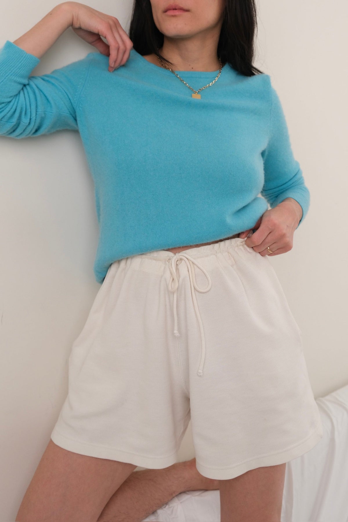 Vintage turquoise cashmere crewneck sweater modeled back view