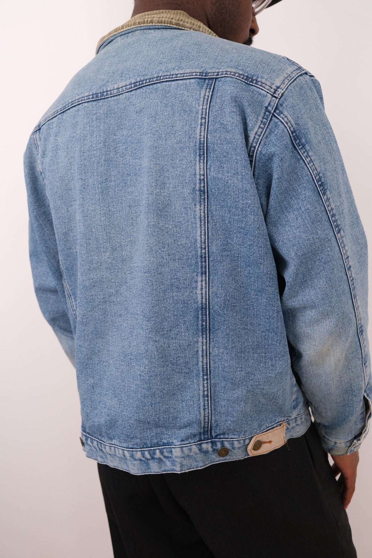 Vintage light wash cotton denim jacket label detail