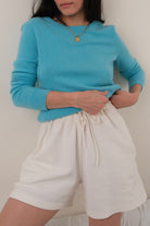 Vintage turquoise cashmere crewneck sweater modeled