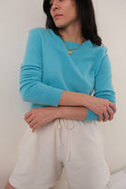 Vintage turquoise cashmere crewneck sweater label detail