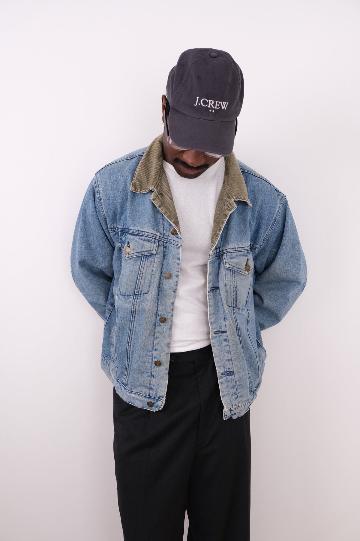 Vintage light wash cotton denim jacket modeled