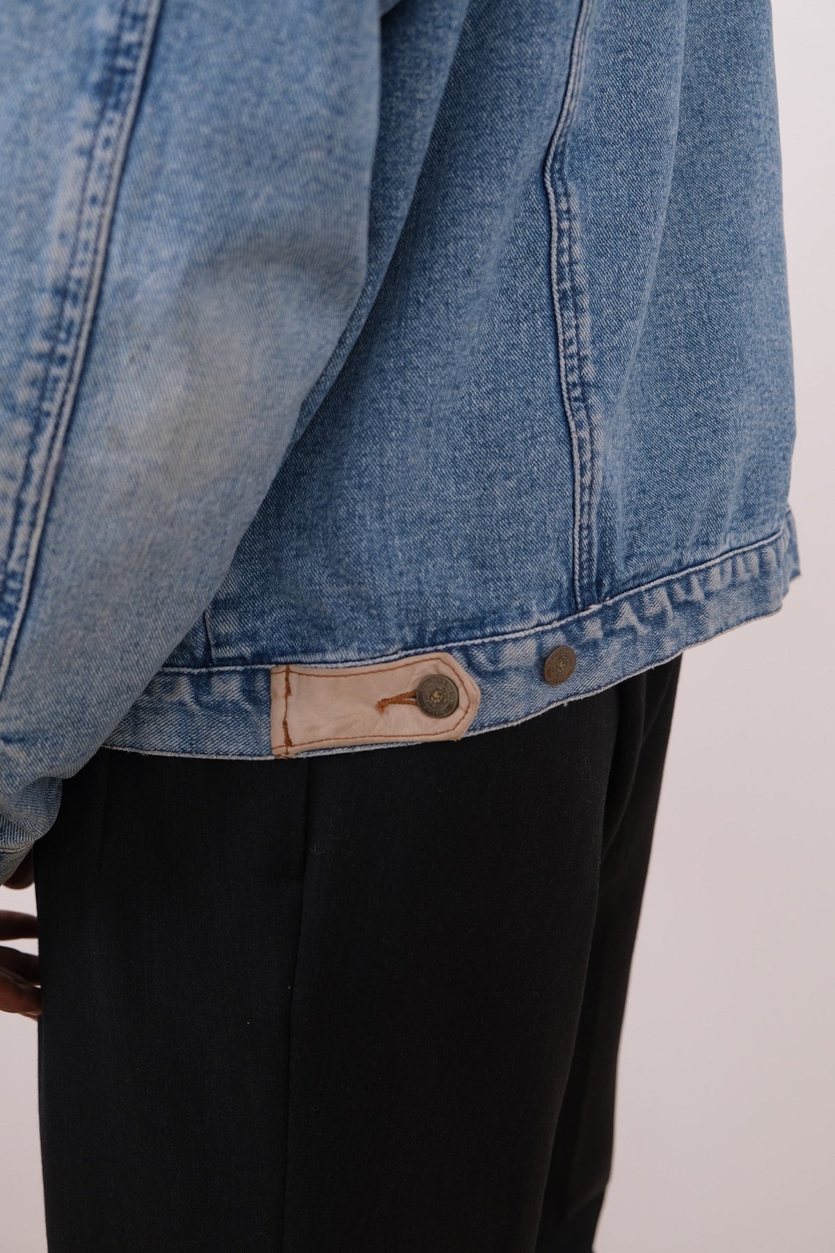 Vintage light wash cotton denim jacket back view